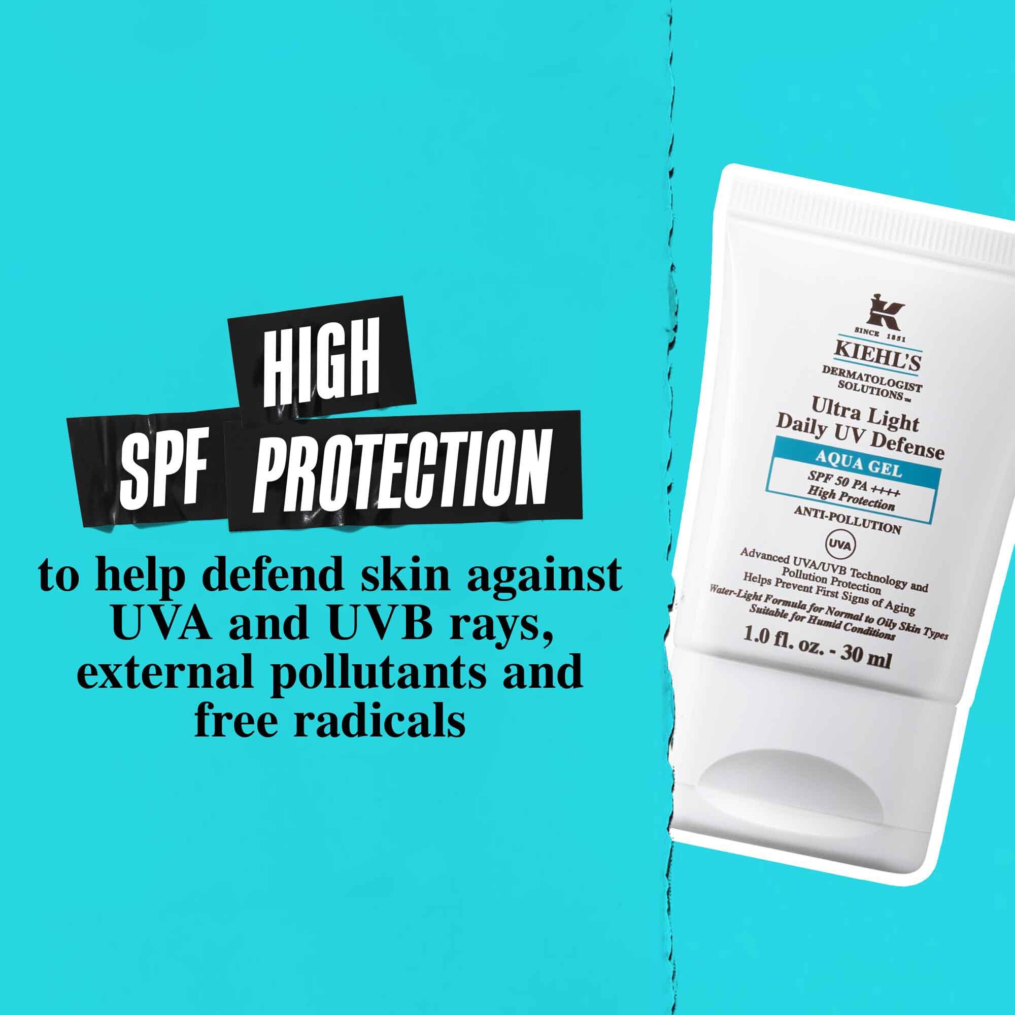 Tuba Ultra Light Daily UV Defense Aqua Gel na modrem pozadi s textem: „Vysoka SPF ochrana pomaha chranit pleť před UVA a UVB paprsky, vnějšimi znečišťujicimi latkami a volnymi radikaly.“