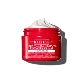 Červeny kelimek Kiehl’s Ultra Facial Meltdown Recovery Cream Whip s texturou našlehaneho kremu.