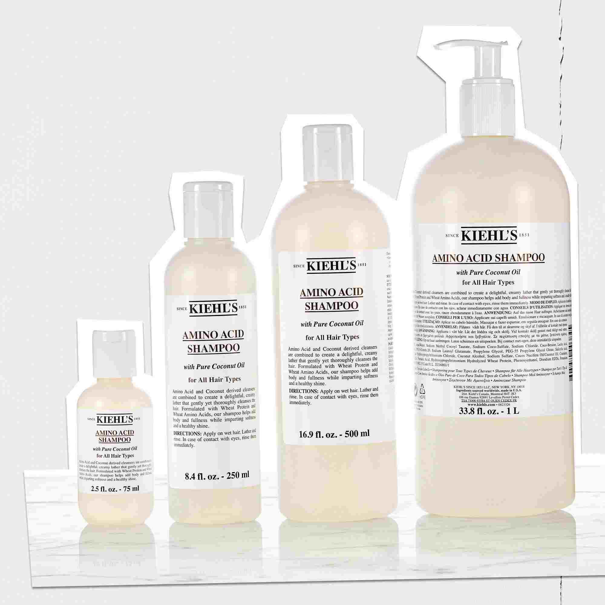 Řada lahvi šamponu Kiehl's Amino Acid v různych velikostech