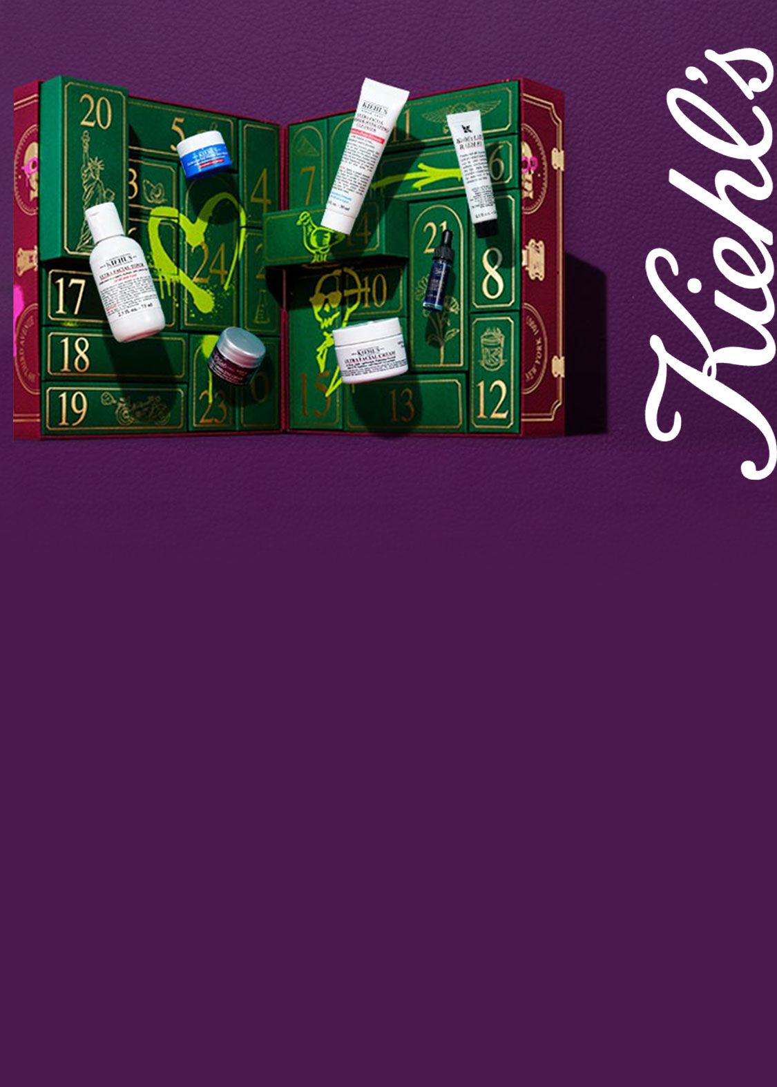Otevřeny, zeleny Kiehl's adventni kalendař s produkty (Ultra Facial Cream, Toner, atd.) na fialovem pozadi s graffiti.