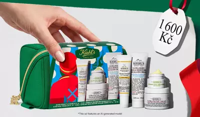 Hydrating Holiday Hits" skincare gift set on a green background, featuring Ultra Facial Cream and Creamy Eye Treatment with Avocado in festive packaging.​