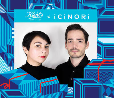 A man and woman pose together in front of a bold, colorful graphic background featuring geometric shapes and gift-like designs, promoting a collaboration between Kiehl's and iCiNORI.