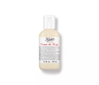 Krem Kiehl's Creme de Corps v malem baleni, určeny na hydrataci pokožky.