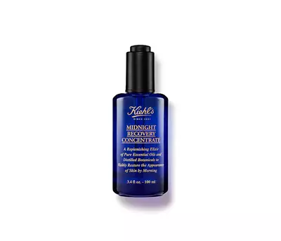 Modry skleněny flakon Kiehl's Midnight Recovery Concentrate, serum pro obnovu pleti s přirodnimi oleji a botanickymi extrakty.